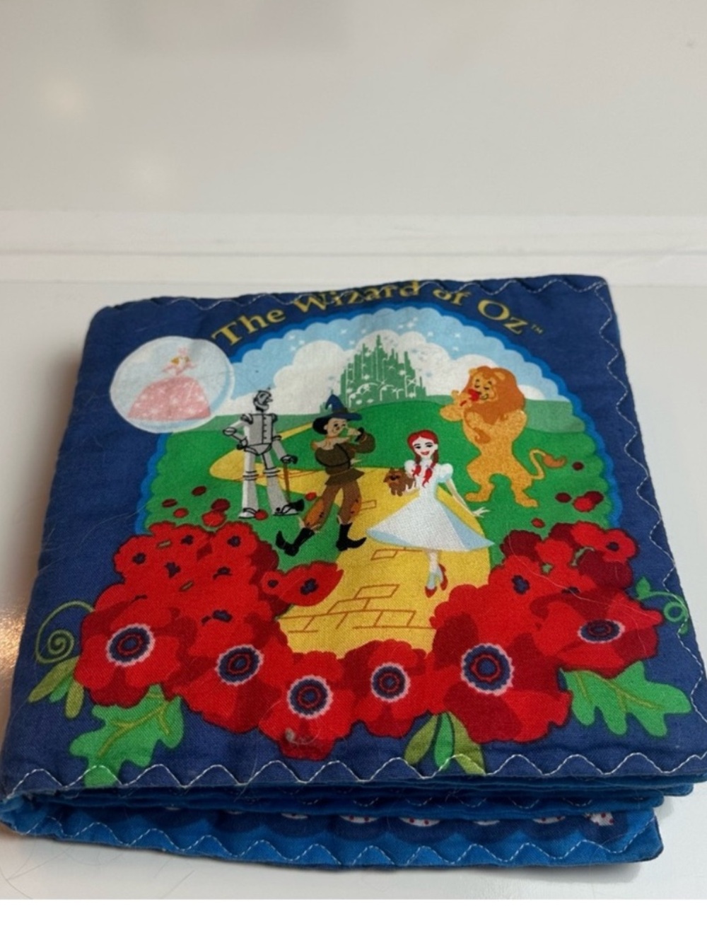 a vintage 80’s or 90’s Wizard of Oz soft cloth children's storybook